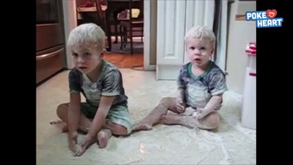 Cute Little Boy Covers Brother in Flour