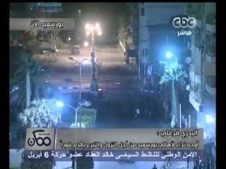 ممكن - متظاهروا بورسعيد يضربون بأسلحة غير معروفة