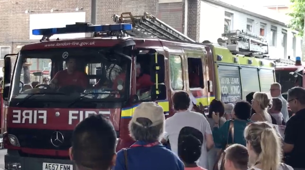 Incredibly Moving Moment Grenfell Tower Memorial Crowds Part For Hero Firefighters
