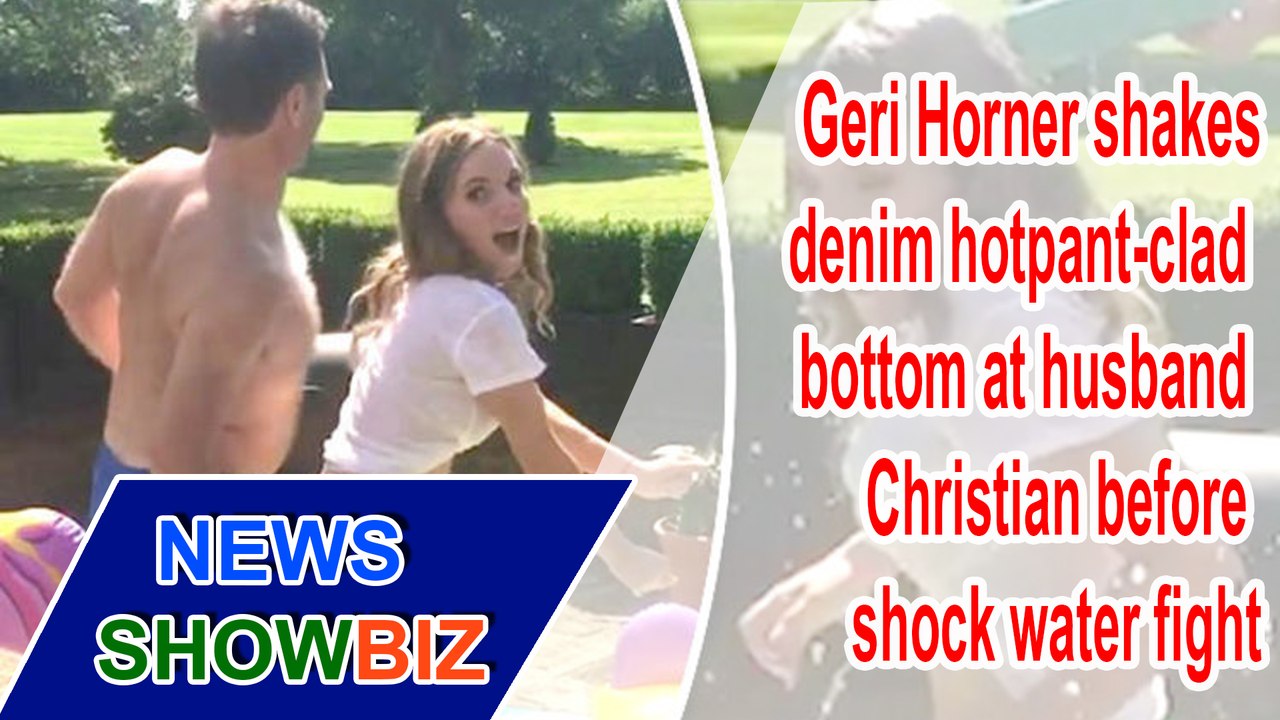 Geri Horner shakes denim hotpant-clad bottom at husband Christian before shock water fight