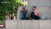 Trafalgar Square, London, swelters on hottest June day since 1976