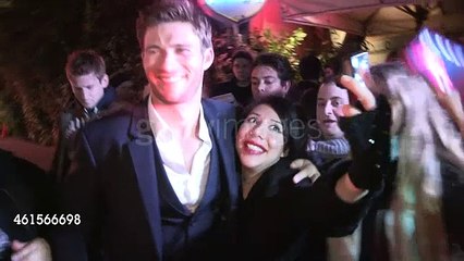 Overdrive star Scott Eastwood signs and posing for