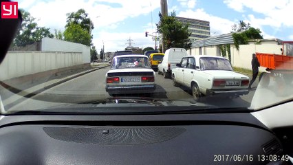 Orange Truck Bumps Bystander