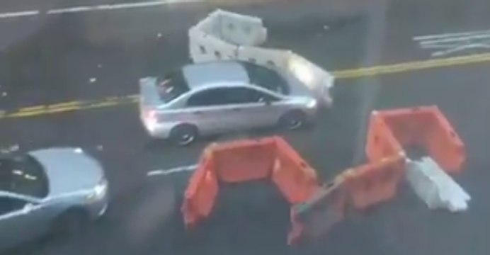 Sudden NYC Storm Blows Construction Barriers Into Traffic
