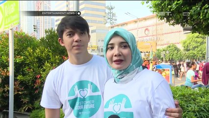 Pengalaman Baru Irwansyah dan Istri Ikuti Acara Car Free Day