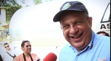 President of Costa Rica Swallows Wasp at Press Briefing
