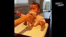Sweet Baby Enjoys Smelling A Flower - Daily Heart Beat (1)