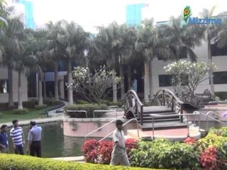 Aung San Suu Kyi plants at Infosys campus.