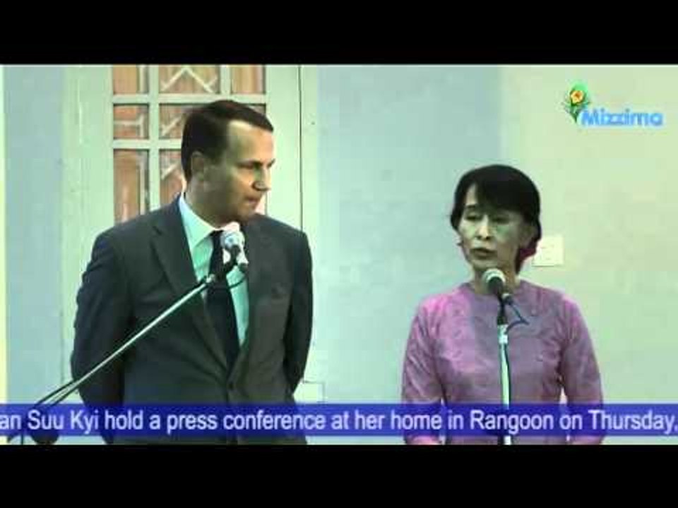 Poland's FM Radoslaw Sikorski and Daw Aung San Suu Kyi hold a press conference