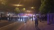 Riot police and youths armed with knives clash in London