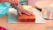 How To Make A GIANT Chocolate Eclair out of CAKE | Yolanda Gampp | How To Cake It