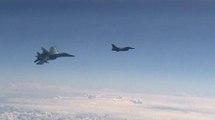 Russian Su-27, Forces Away NATO F-16 After It Approaches The Russian Defence Minister's Plane.