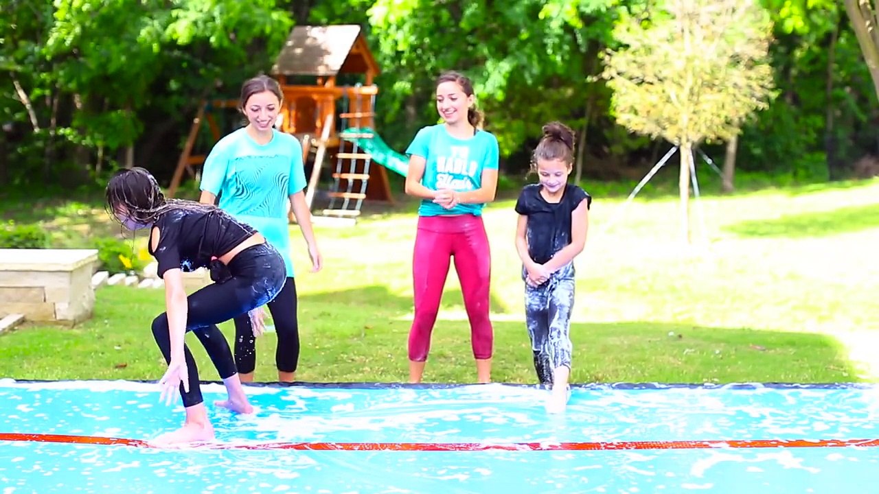 FUNNY SLIP N SLIDE GYMNASTICS CHALLENGE! (ft. Hayley & Annie LeBlanc from Bratayley)