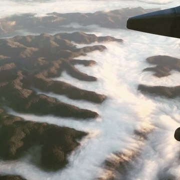 Thick Clouds Roll Off Mountains Near Sydney in Mesmerizing Display