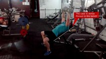 Press of dumbbells on an incline bench