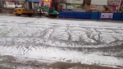 Hail storm brings flooding to central China