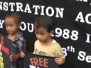 Activists protest on 20th anniversary of military coup