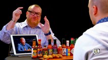 Superfan Brett Baker Grills Sean Evans Over Spicy Wings | Hot Ones