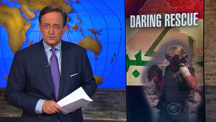 American aid worker runs through ISIS gunfire to rescue child