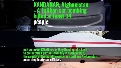 Скачать видео: Afghan Bombing Kills Dozens of Workers Lined Up for Pay