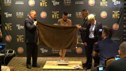 Sergio da Silva tries to trick the scale at Bellator NYC weigh-ins