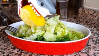 shark toy playing making saladss
