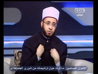 ممكن-اسامة الأزهري يرفق بقط فى الازهر الشريف