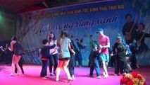 Scottish folk dance by Scottish students and cute Vietnamese children in Vietnam