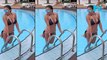 Busty Imogen Thomas shows off her sensational curves and pert derriere in barely-there bikini for sizzling poolside display in Greece