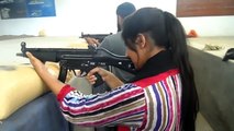 Pakistani Student Firing a MP5 like a Plastic Gun