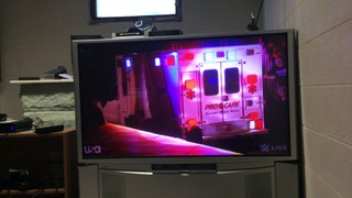 Roman Regins gets thrown into a Ambulance