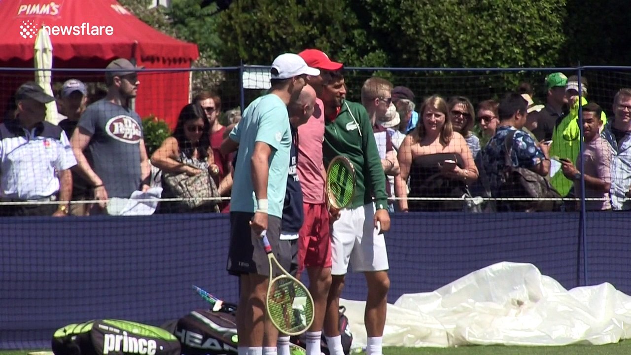 Djokovic poses for pictures ahead of Wimbledon warm-up