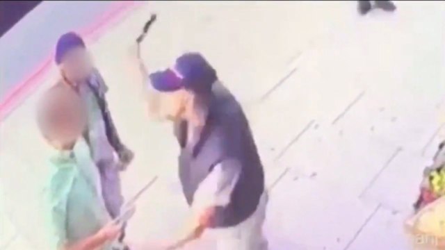 Shocking CCTV footage shows assault with bottle on London street