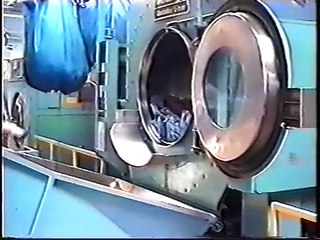 Material handling shuttle coveyors for heavy laundry work