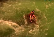 California Highway Patrol Chopper Rescues Swimmer Stuck on Rock in Raging River