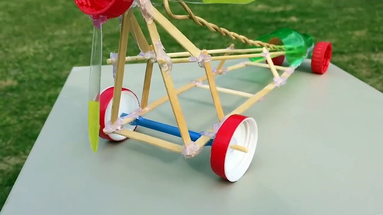 How to Make a Car - Rubber Band Powered Car Out...