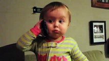 Baby Talks to Dad on Phone