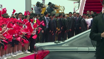 China's President Xi arrives in divided Hong Kong