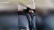 Rude plane passengers get angry as they are not let off the aircraft first