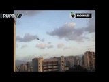 RAW: Hijacked military helicopter strikes Venezuela court
