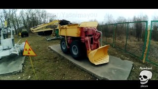 Radioactive vehicles and robots in Chernobyl city. Exclusion zone. Ghost town