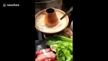 Amateur chef cooks Chinese food in her car