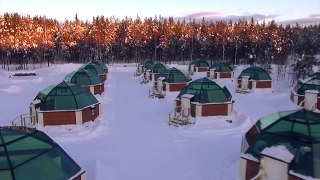 Discovering northern lights in Arctic Glass Igloos in Rovaniemi in Lapland Finland