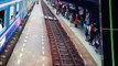 Railway Workers Hold Back Woman From Tracks