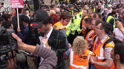 Stampede and scuffles as Jeremy Corbyn leaves demo