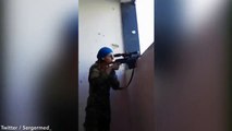 Fearless female Kurdish sniper laughs as SS bullet just misses head