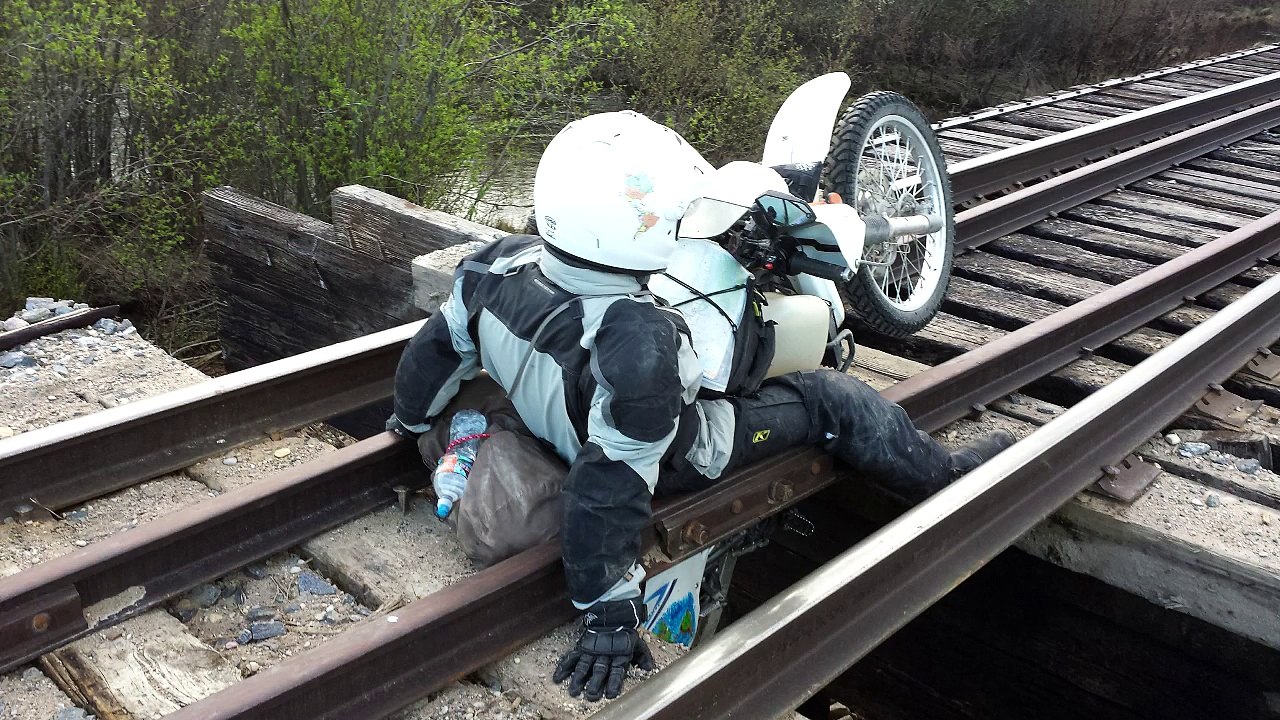 Motorcycle Falls Through Railroad Track