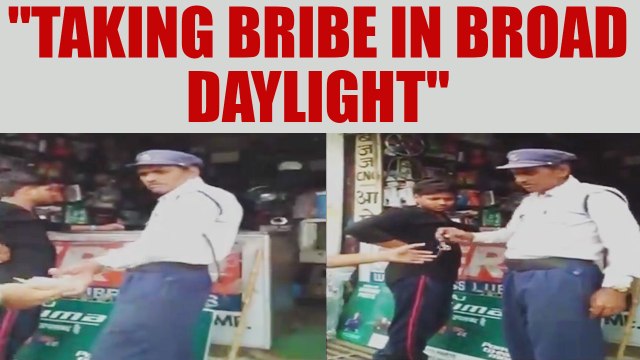 Gwalior Traffic police constable caught taking bribe | Oneindia News