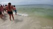 Shark swims incredibly close to shore off US beach