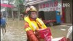 Hunan Firefighters Help Evacuate Children and Elderly Trapped by Floods